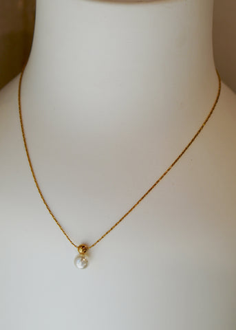 The "Kai: Gold Stainless Steel Teardrop Pendant Necklace